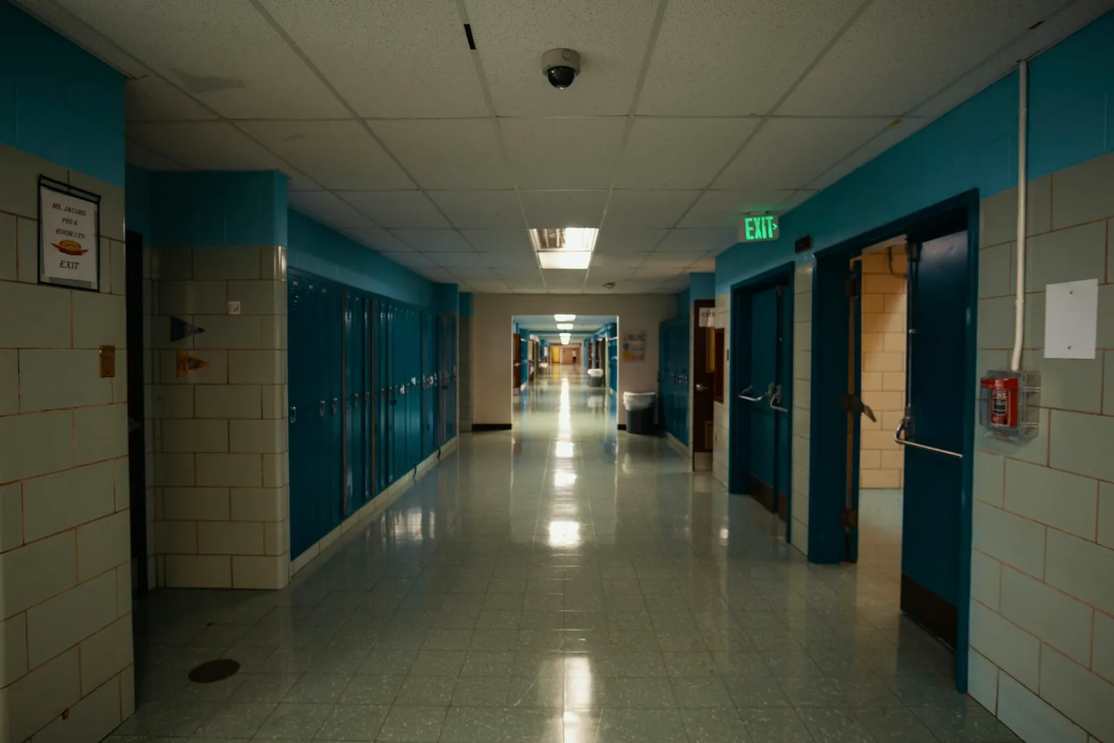 Empty school corridor lined with lockers